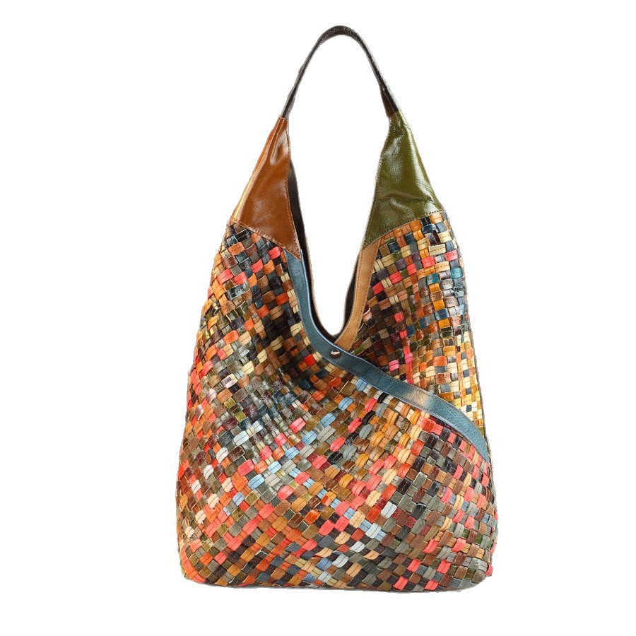 Multicolored woven handbag on a white background