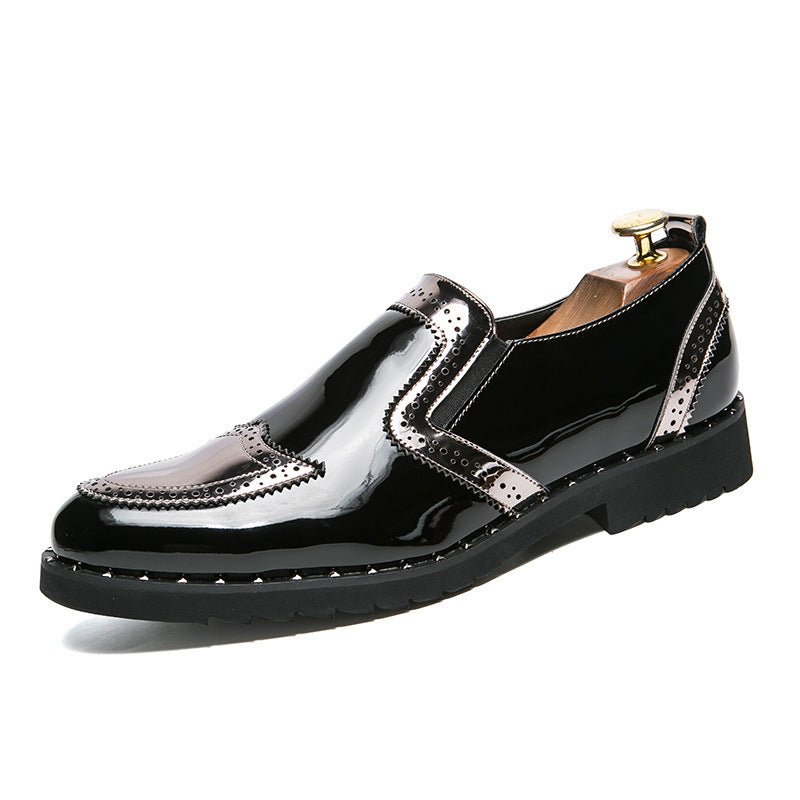 Black shoes with silver accents on a white background