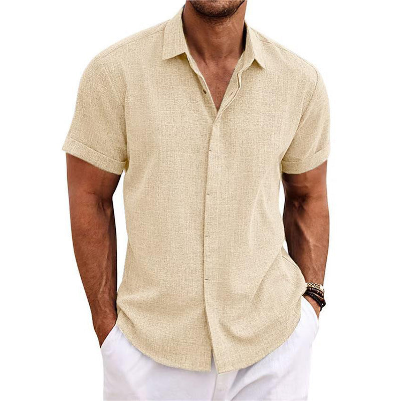 Man wearing a beige short-sleeve shirt on a white background