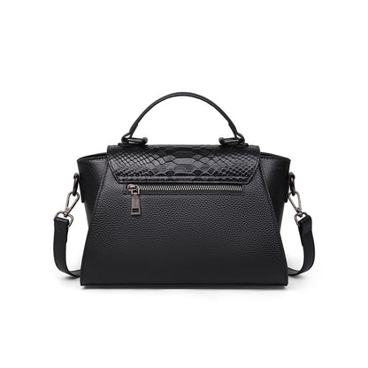 Black handbag with textured pattern on a white background