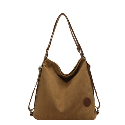 Brown shoulder bag with drawstring on a white background