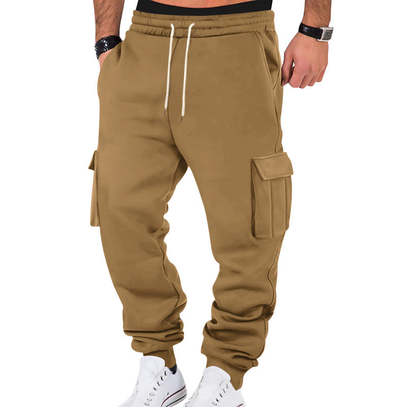 Tan cargo jogger pants worn by a person on a white background