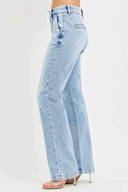 Light blue jeans worn by a person on a white background