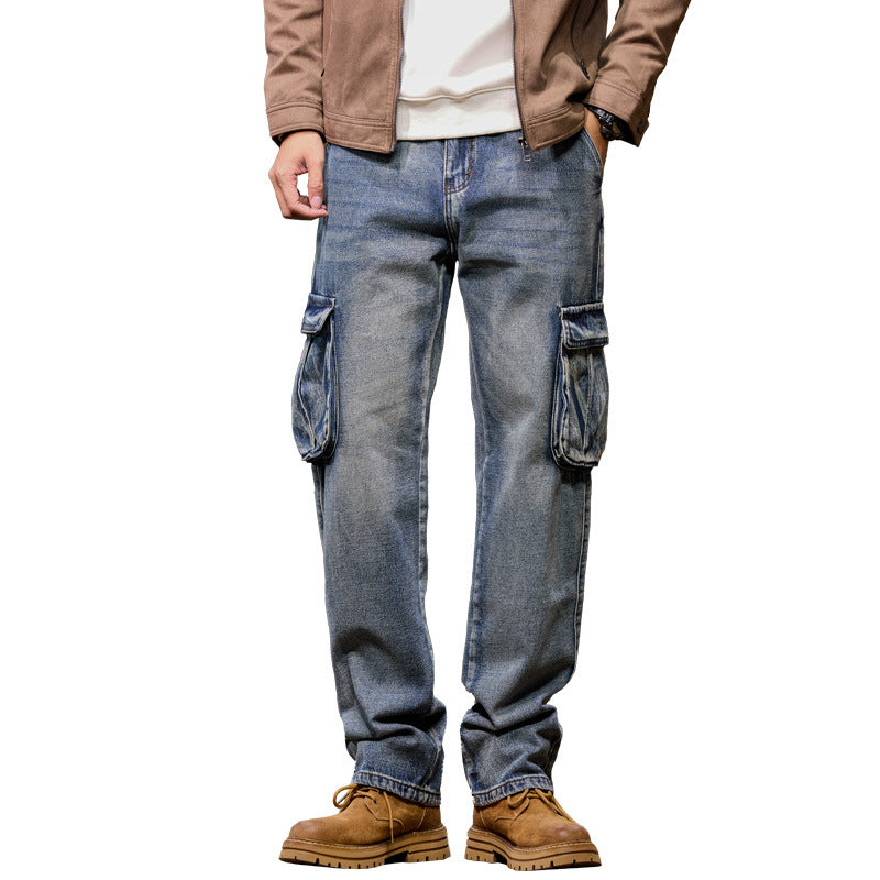 Person wearing blue cargo jeans with a white background