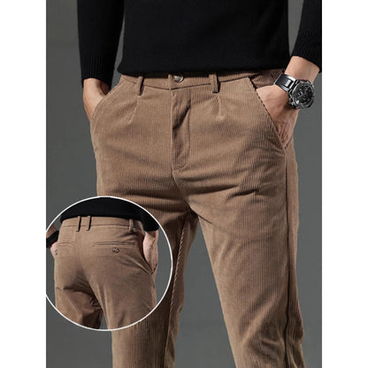 Brown corduroy pants with a close-up detail on a gray background