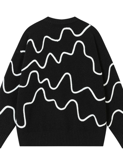 Black sweater with white wavy lines on a white background