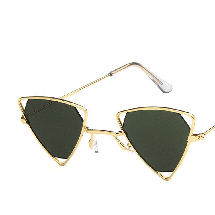 Gold-framed sunglasses with green lenses on a white background