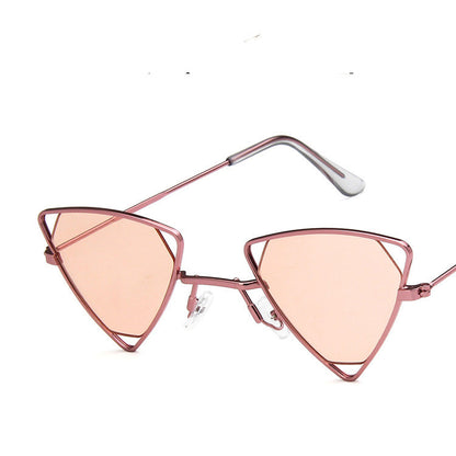 Pink cat-eye sunglasses on a white background