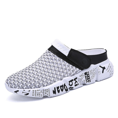 White slip-on shoe with black text and a black strap on a white background