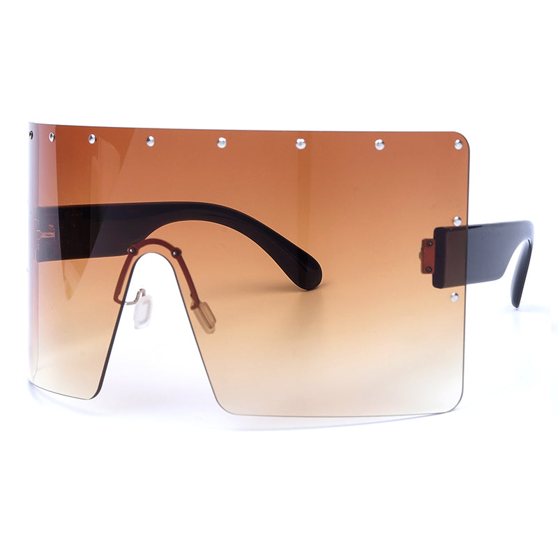Sunglasses with a gradient orange lens on a white background