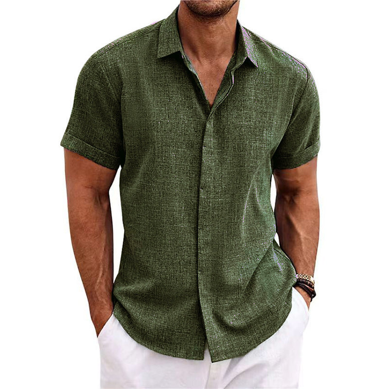 Man wearing a green short-sleeve shirt on a white background