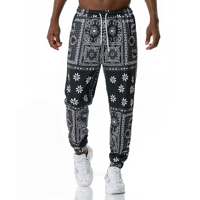 Black and white patterned pants worn by a person on a white background
