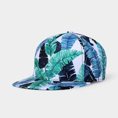 Cap with tropical leaf pattern on a light gray background