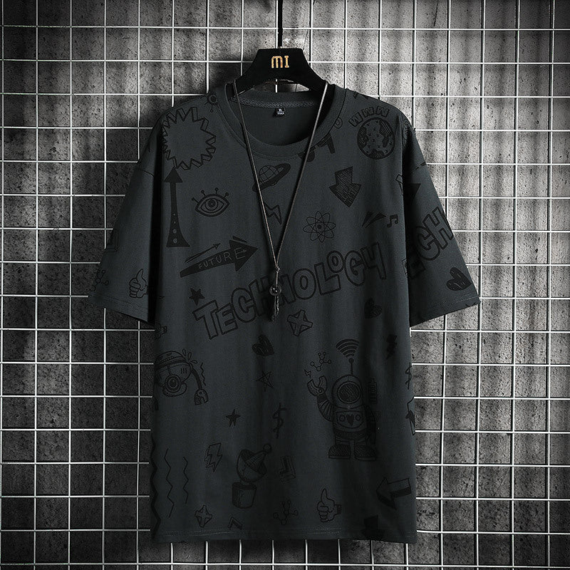 Black t-shirt with text and symbols on a hanger against a tiled wall.