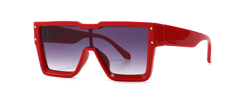 Red sunglasses with a white background