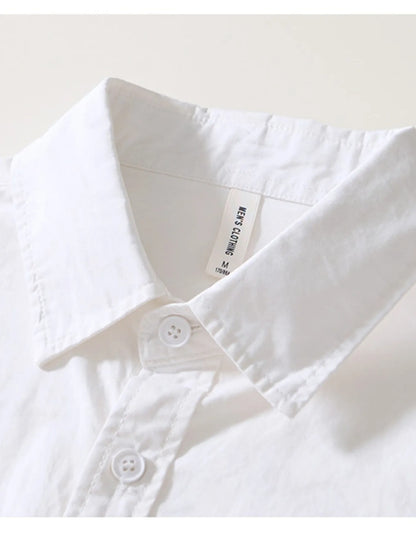 White shirt with a brand label on a light background