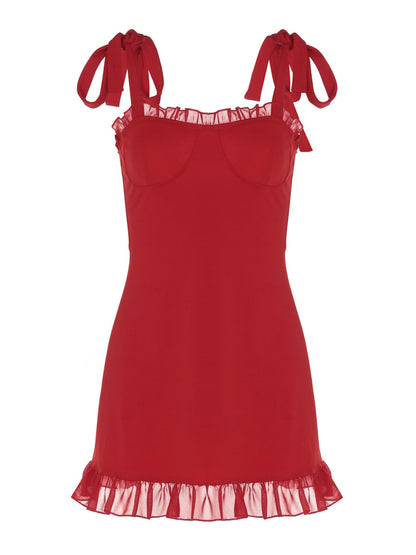 Red nightgown with lace details on a white background