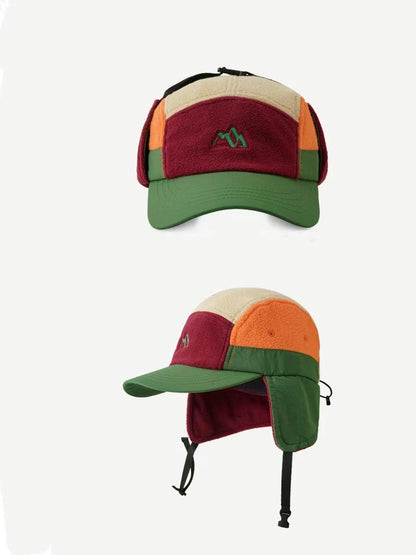 Colorful cap with ear flaps on a white background