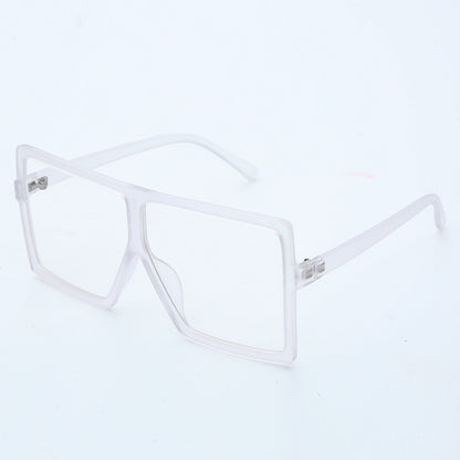 Clear eyeglasses on a light gray background