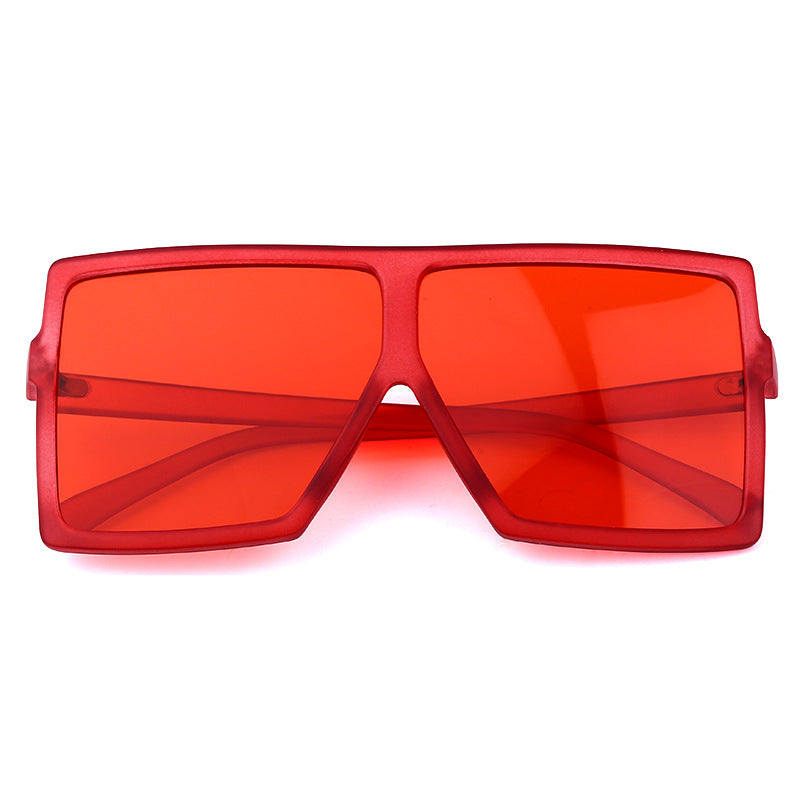 Red sunglasses with a white background