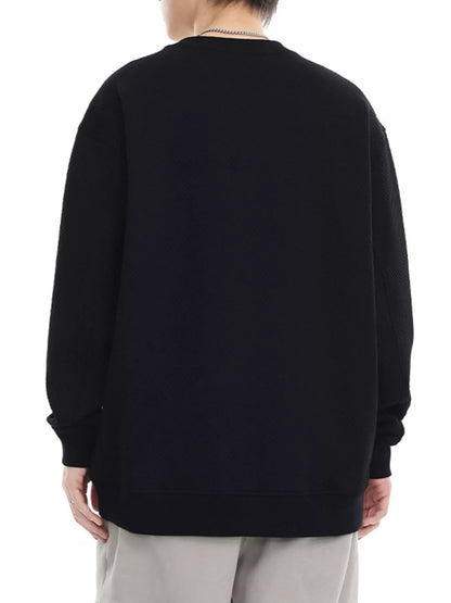 Person wearing a black sweatshirt from behind on a white background