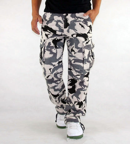 Camouflage pants worn by a person on a white background