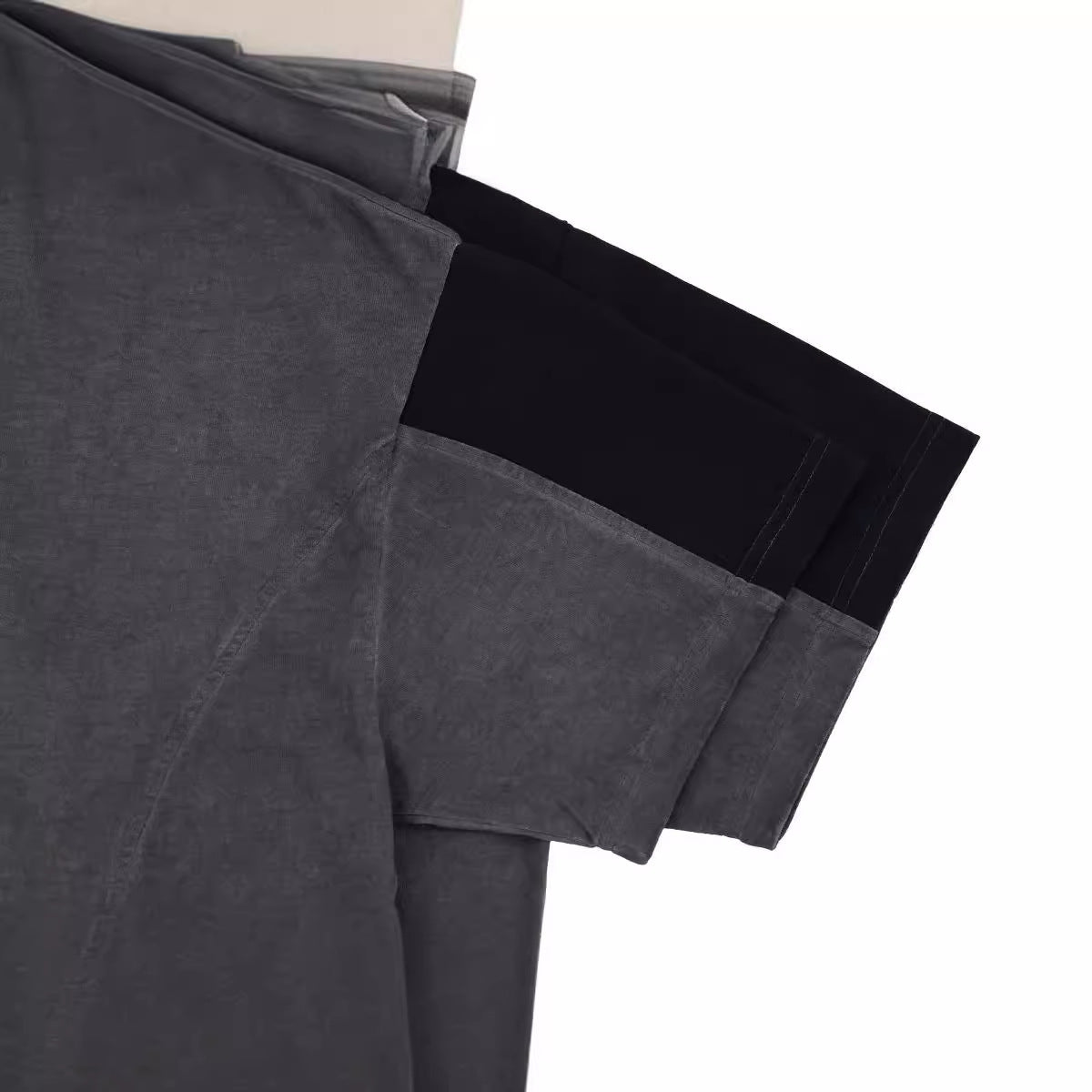 Gray and black fabric swatches on a white background