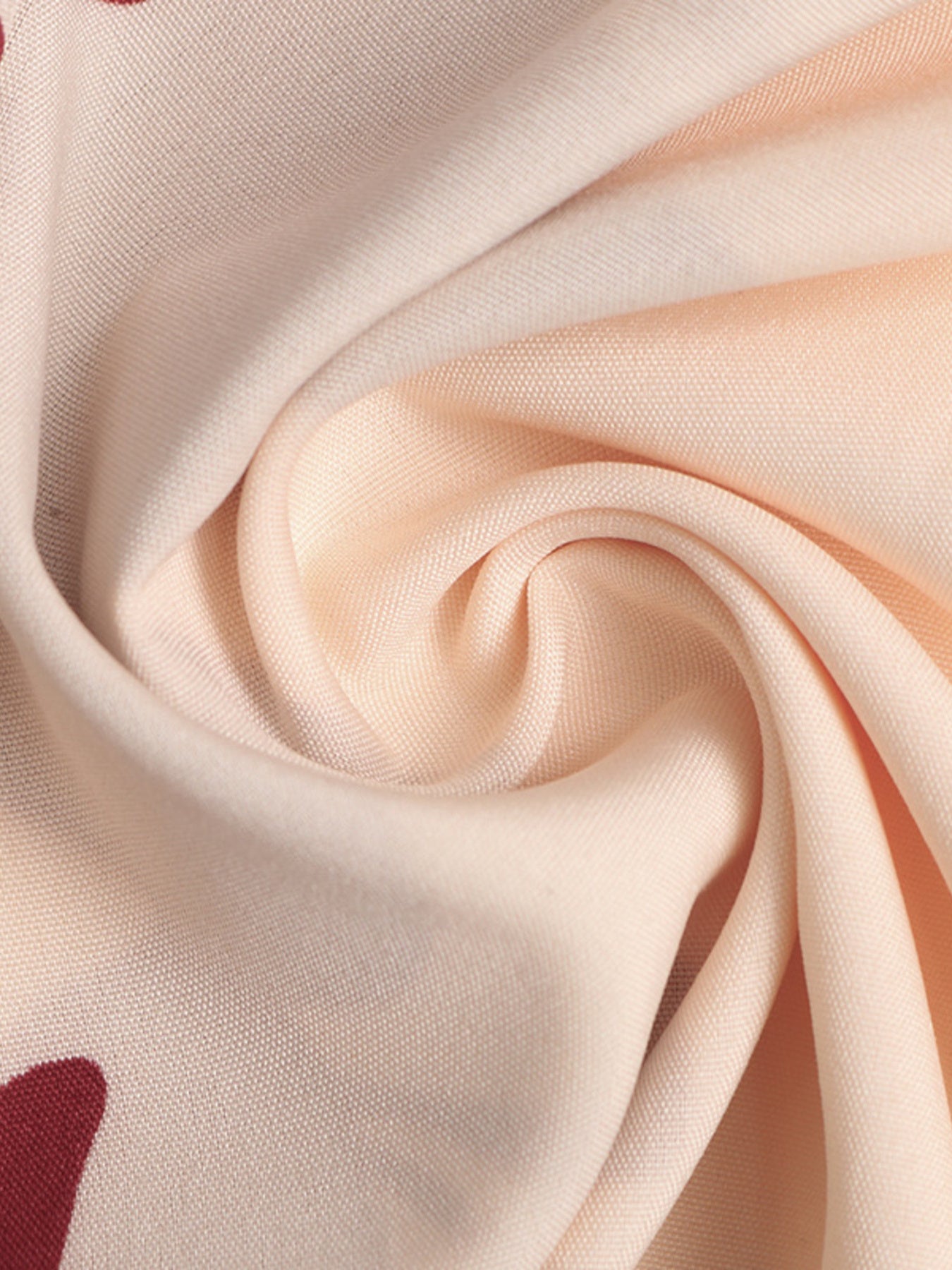 Close-up of beige fabric with a subtle pattern