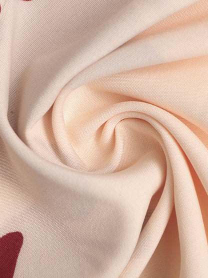 Close-up of beige fabric with a subtle pattern