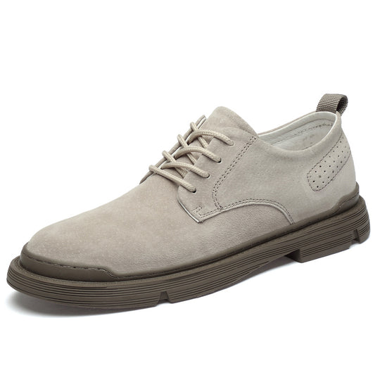 Gray suede shoe on a white background