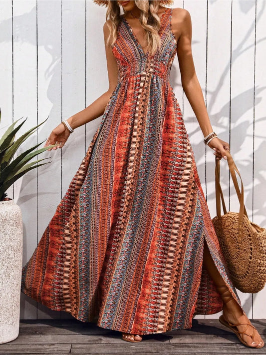 Woman wearing a patterned dress holding a straw bag against a wooden background