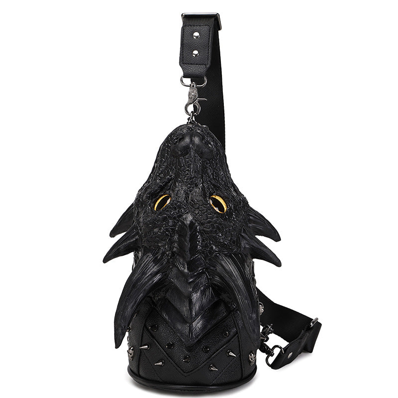 Black dragon-shaped backpack on a white background