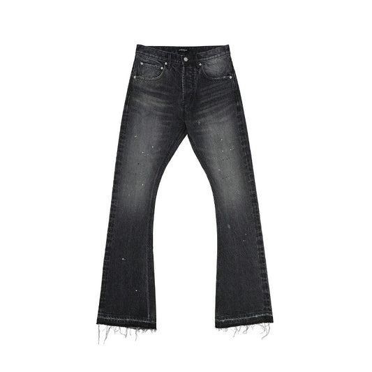 Black distressed jeans on a white background