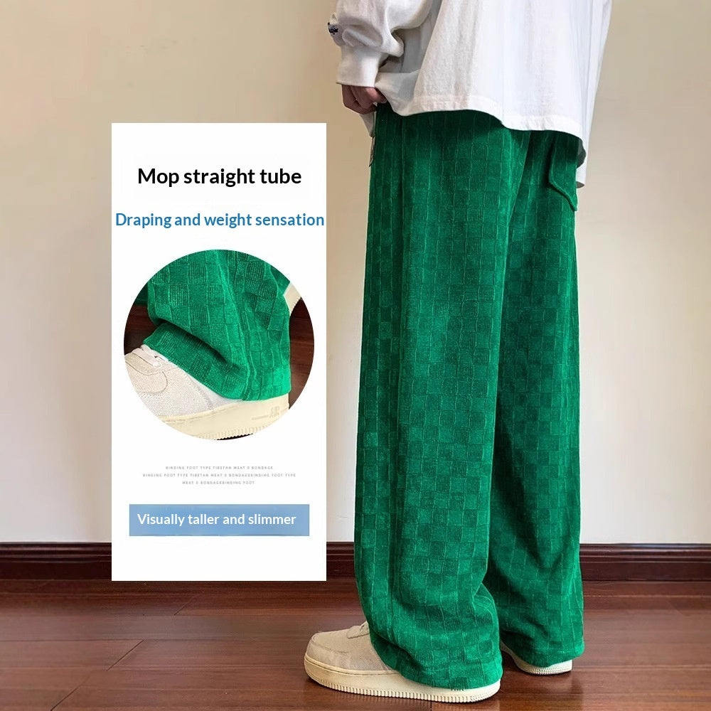 Person wearing green pants with a banner on the wall describing mop straight tube features.