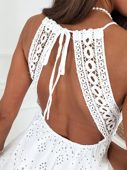 White crochet halter top worn by a person on a white background
