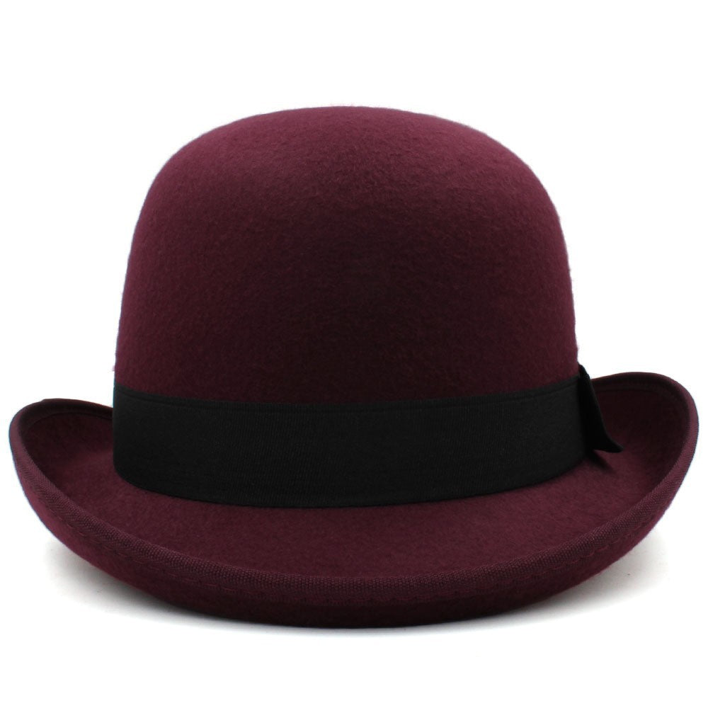 Maroon bowler hat with a black band on a white background