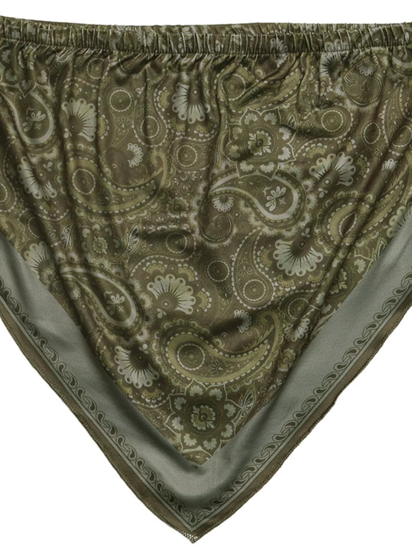 Patterned fabric with paisley design on a plain background