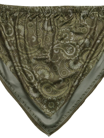 Patterned fabric with paisley design on a plain background