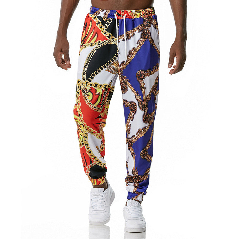 Colorful patterned pants worn by a person on a white background