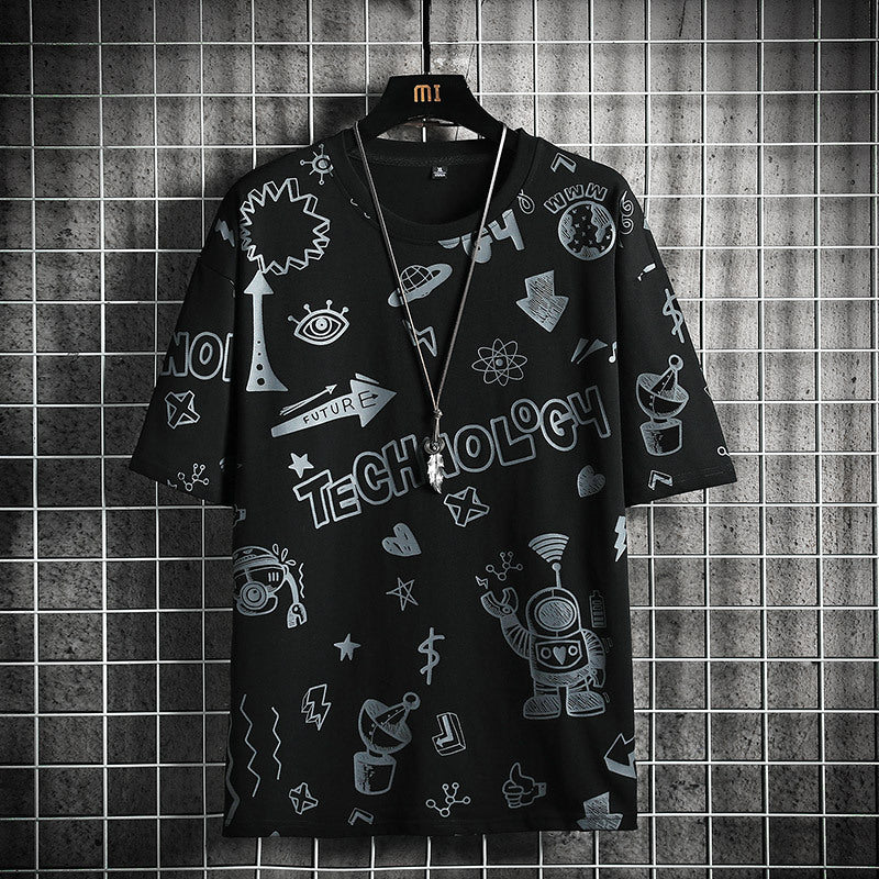 Black t-shirt with white graphics and text on a hanger against a tiled wall.