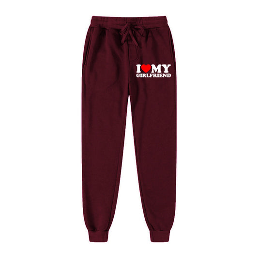 Maroon sweatpants with 'I ❤️ MY GIRLFRIEND' text on a white background