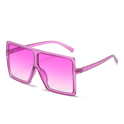 Pink sunglasses with a gradient effect on a white background