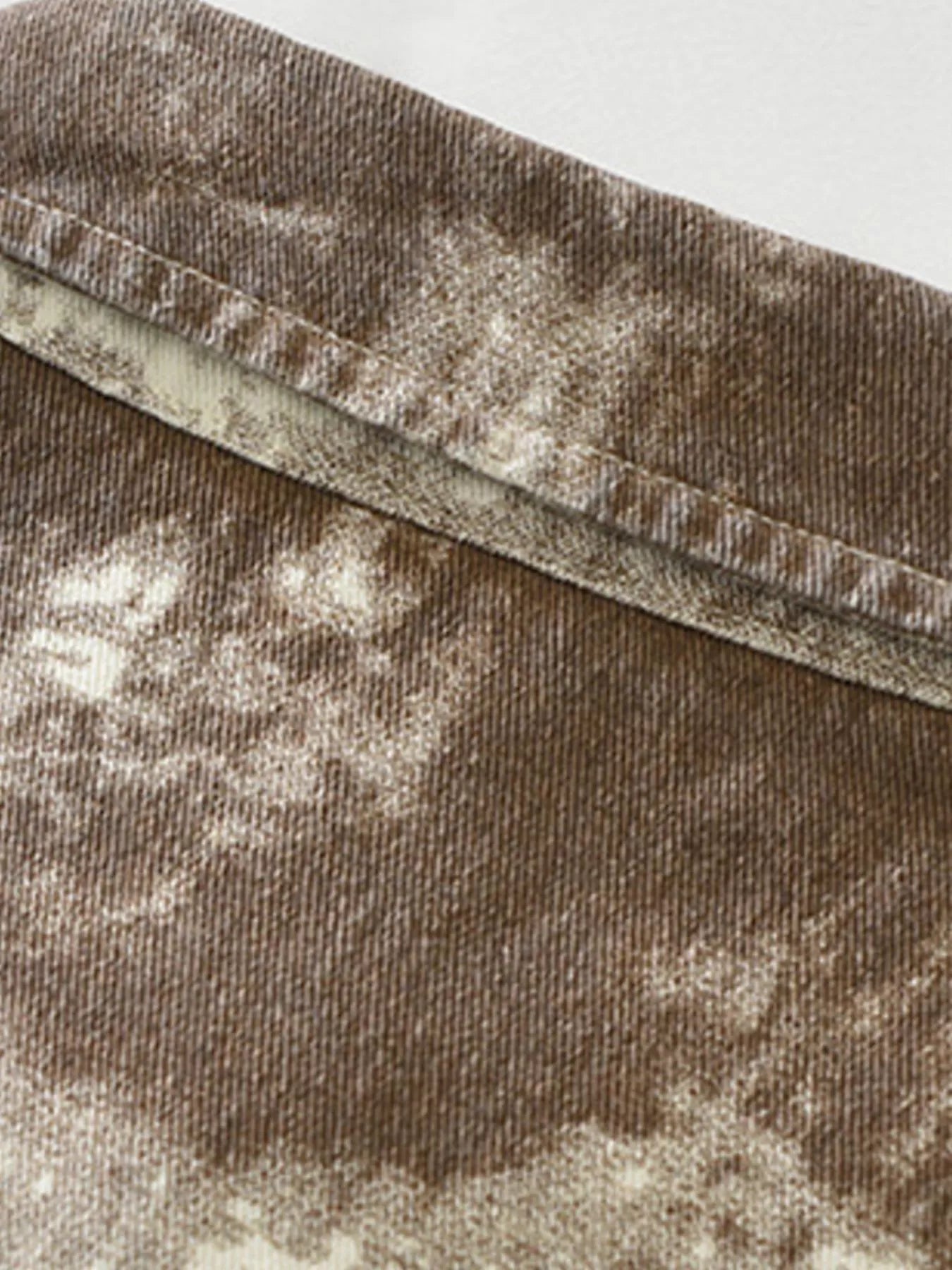 Close-up of brown fabric with a textured pattern