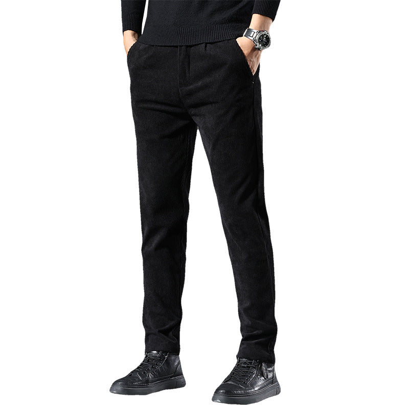 Black pants worn by a person on a white background