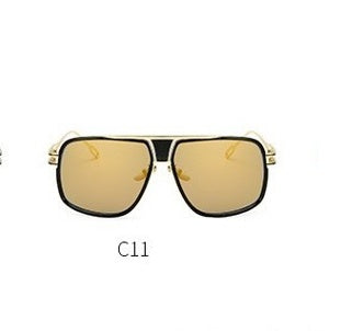 Gold-framed sunglasses with a white background