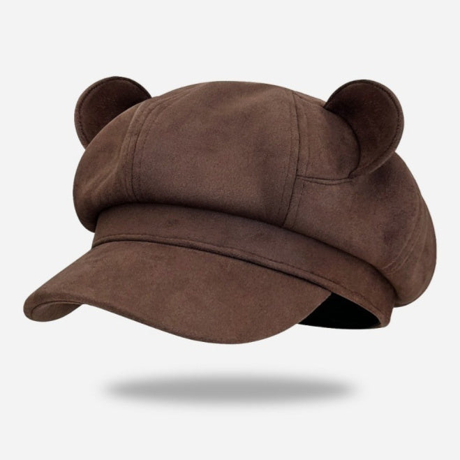 Brown cap with bear ears on a white background