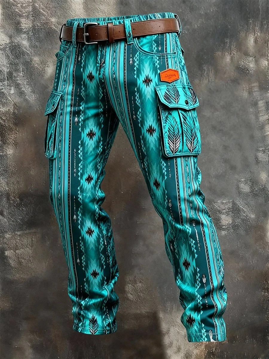 Teal patterned pants with a brown belt on a textured gray background