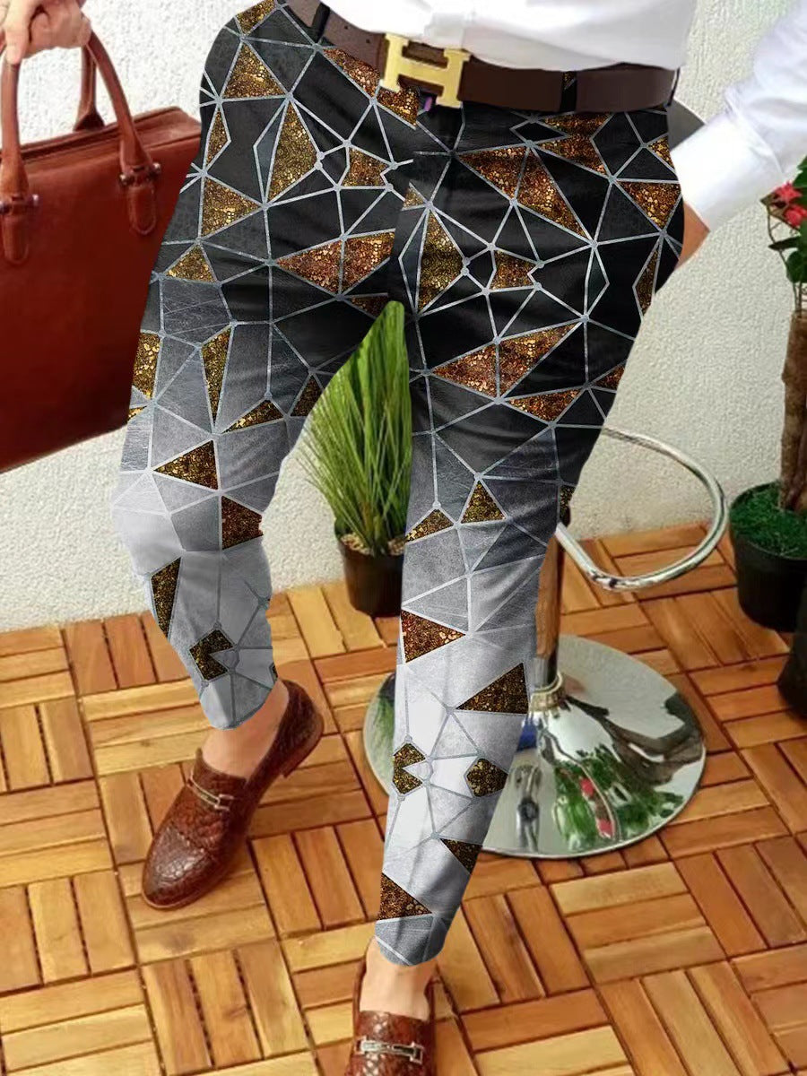Person wearing a patterned skirt with geometric design, standing on a wooden floor.