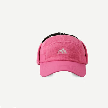 Pink cap with a logo on a light pink background