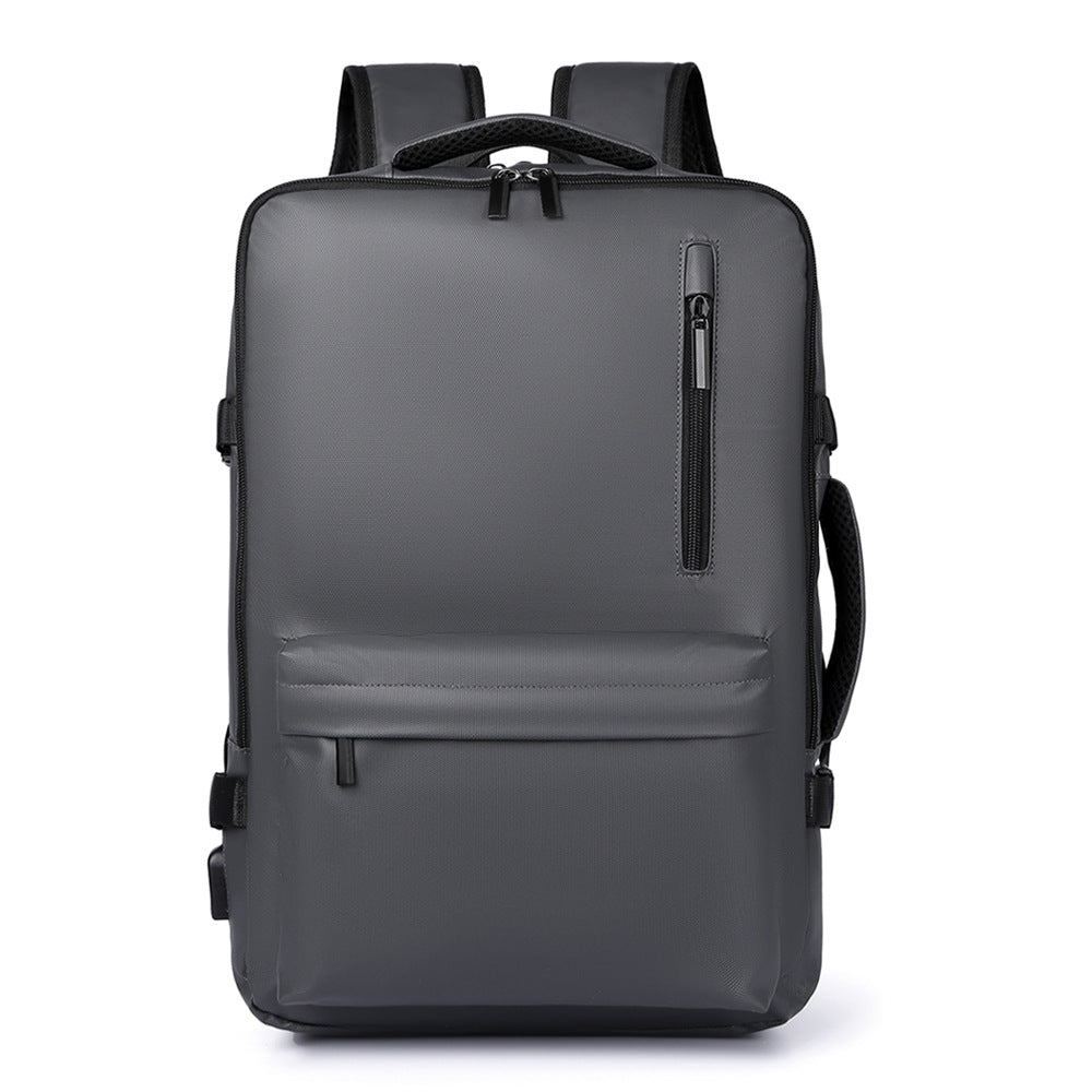 Gray backpack with multiple pockets on a white background